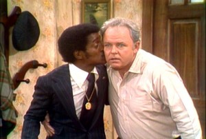 In a cameo appearance, Sammy Davis, Jr. kisses Archie Bunker, (Carol O'Conner).