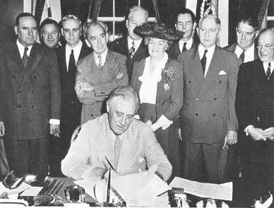 FDR signs into the the GI Bill of Rights, June 22, 1944.